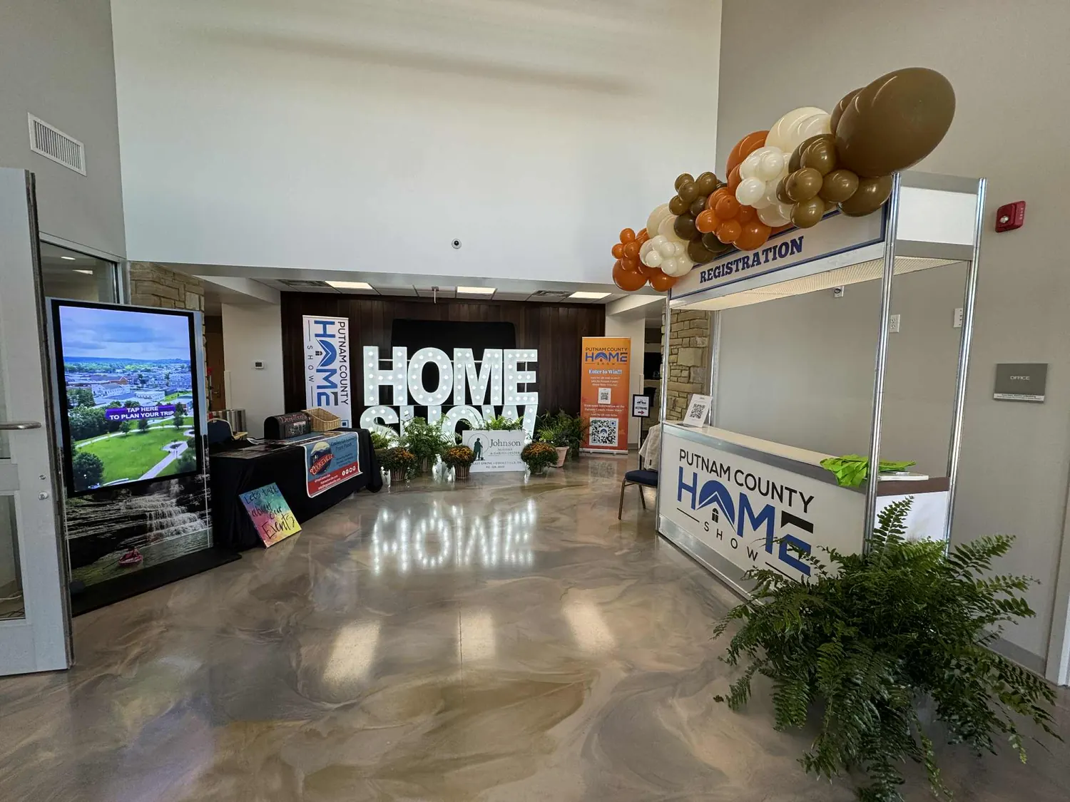 The Putnam County Home Show registration entrance with Fall decor